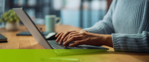 Hands typing on laptop, symbolizing Sustaining Value Through Strategic Marketing in the Marketing Certificate.